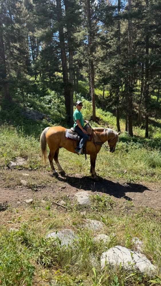 Me on a horse named “Zeke” and he was a very good boy 