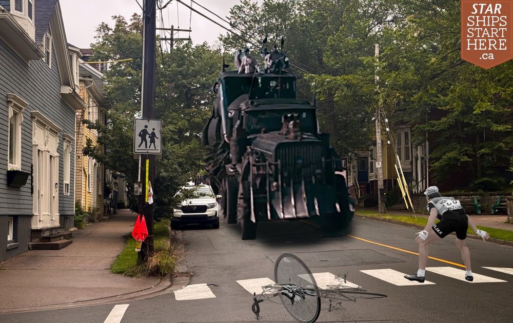 A war rig looms down Halifax's quiet Morris Street while a dismounted cyclist readies himself to face it head-on in a "come at me bro" pose