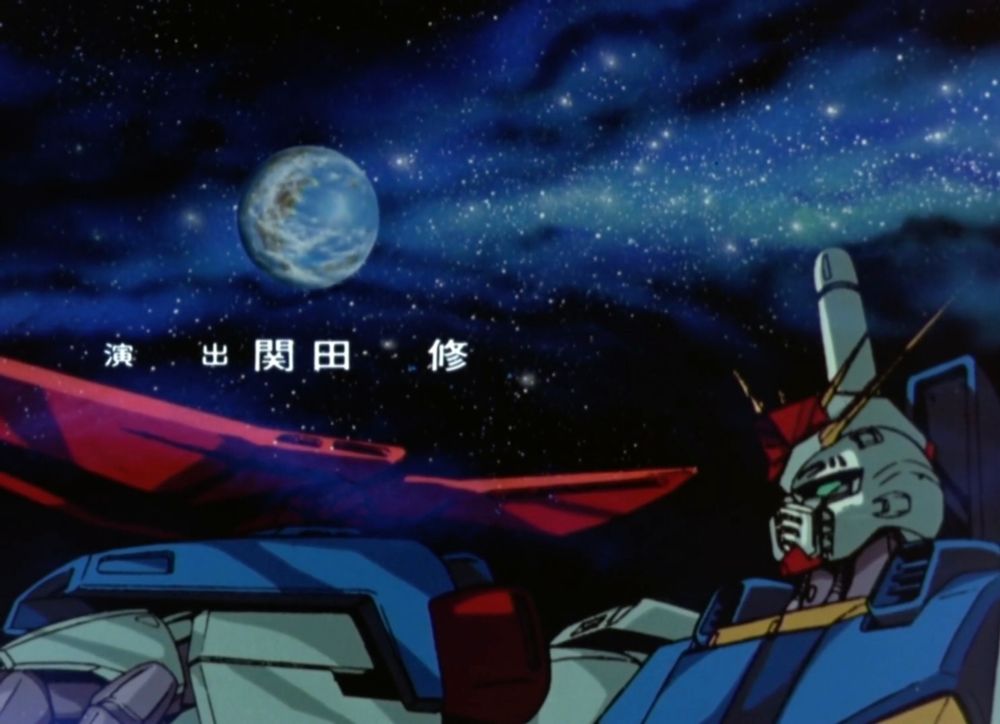 The Double-Zeta in space, extending its right arm outward towards the left end of the frame, the distant Earth above it.