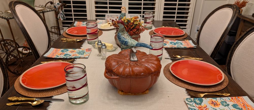 Dinner table with a pumpkin shaped dutch oven