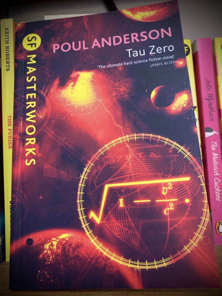 Cover of the Gollancz SF Masterworks edition of Poul Andersons SF novel ‘Tau Zero’, depicting a series of planetary bodies overlayed by a circle containing a mathematical symbol.