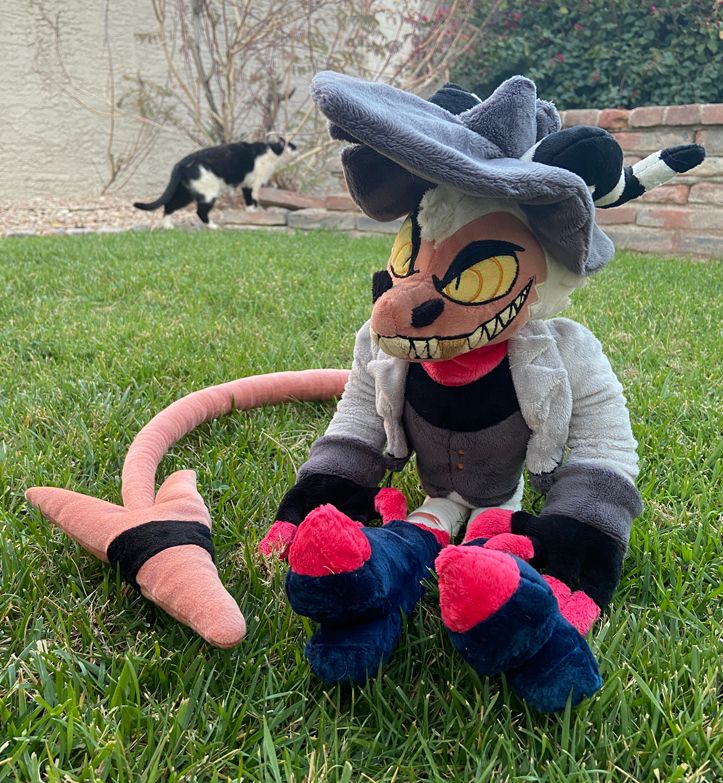 Striker plush sitting down from the front