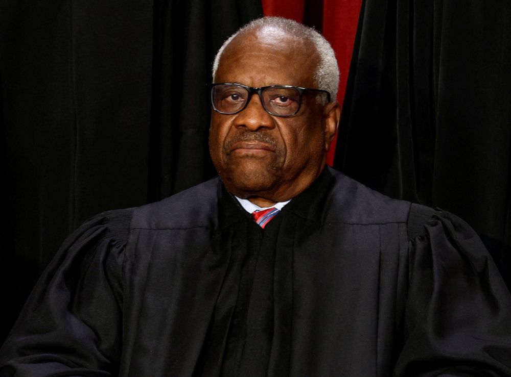 New documents show unreported trips by Justice Clarence Thomas