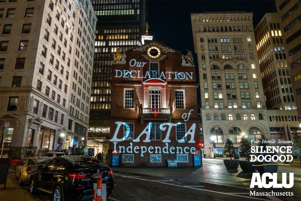 Silence DoGood projection on the Old State House reading "Our Declaration of Data Independence."