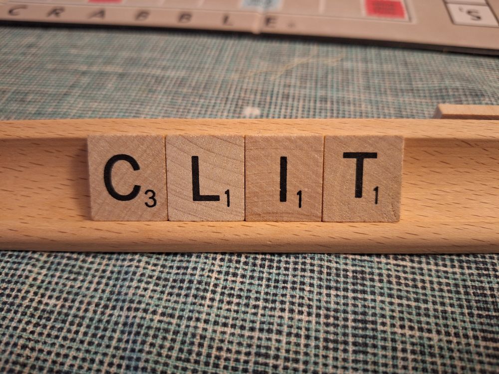 Scrabble blocks that spell CLIT