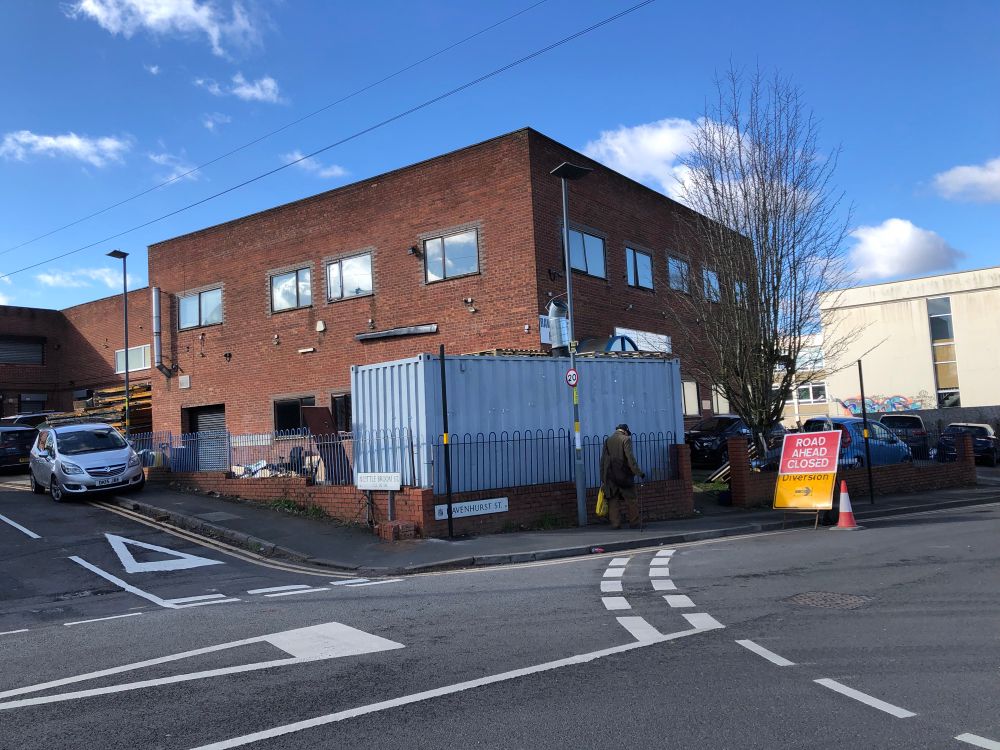 Photograph of an abandoned brick building in an industrial area in central Birmingham