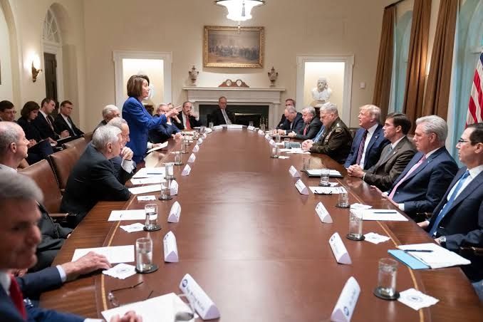 Nancy Pelosi pointing her finger at Trump in 2019 saying "why is it with you all roads lead to Russia?"