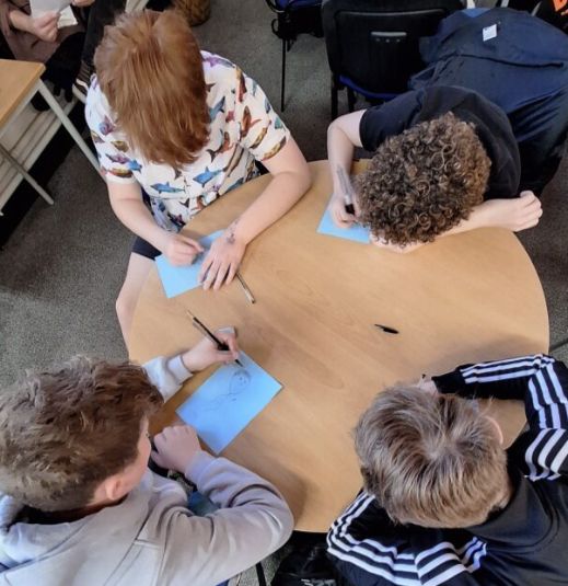 Group focused on drawing