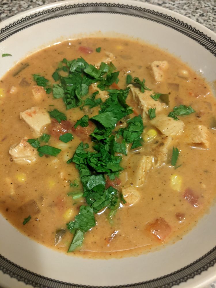 A bowl of creamy tortilla soup.