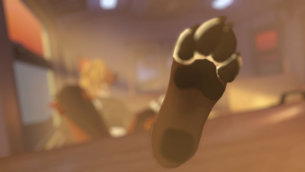 vrchat photo:
Phox relaxing on a metro seat, one paw resting up on the back of the seat in front, sole presented in the foreground