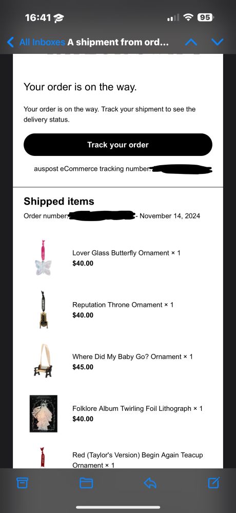 A screenshot of an email from the Taylor Swift Australia Merch store stating that “Your order is on its way”. 