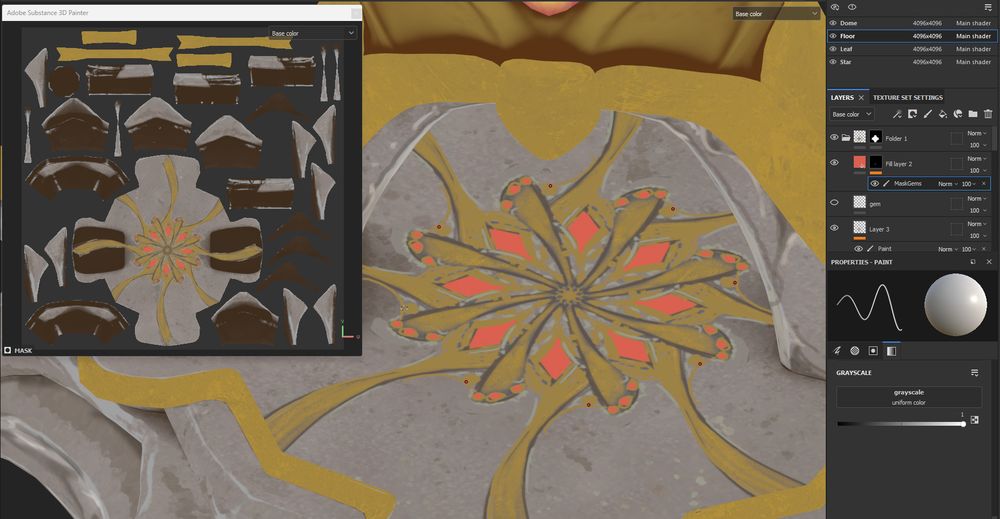 A screenshot from Substance Painter showcasing a floor (both geometry 3D view and a UV view). In the middle is a painted star with red gems that are missing their shine.