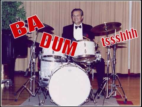 Guy in a tux at a drum set, text over says "BA DUM tssshh"