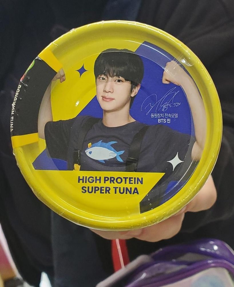 Picture of Jin on a yellow can of tuna
