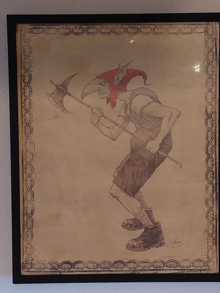 Handdrawn and framed picture of a Redcap fae wearing raggedy clothes, iron boots, an iron pikestaff, and his signature Red Cap.