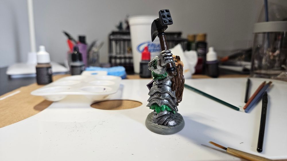 Side view of painted Enlarged Dark Dwarf Smiter by Reaper Minis