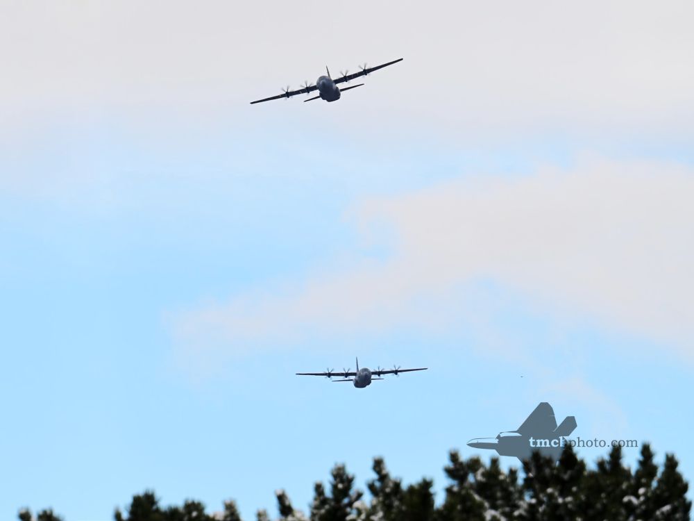 A pair of CC-130J fly the Remembrance Day Flypast in Toronto.