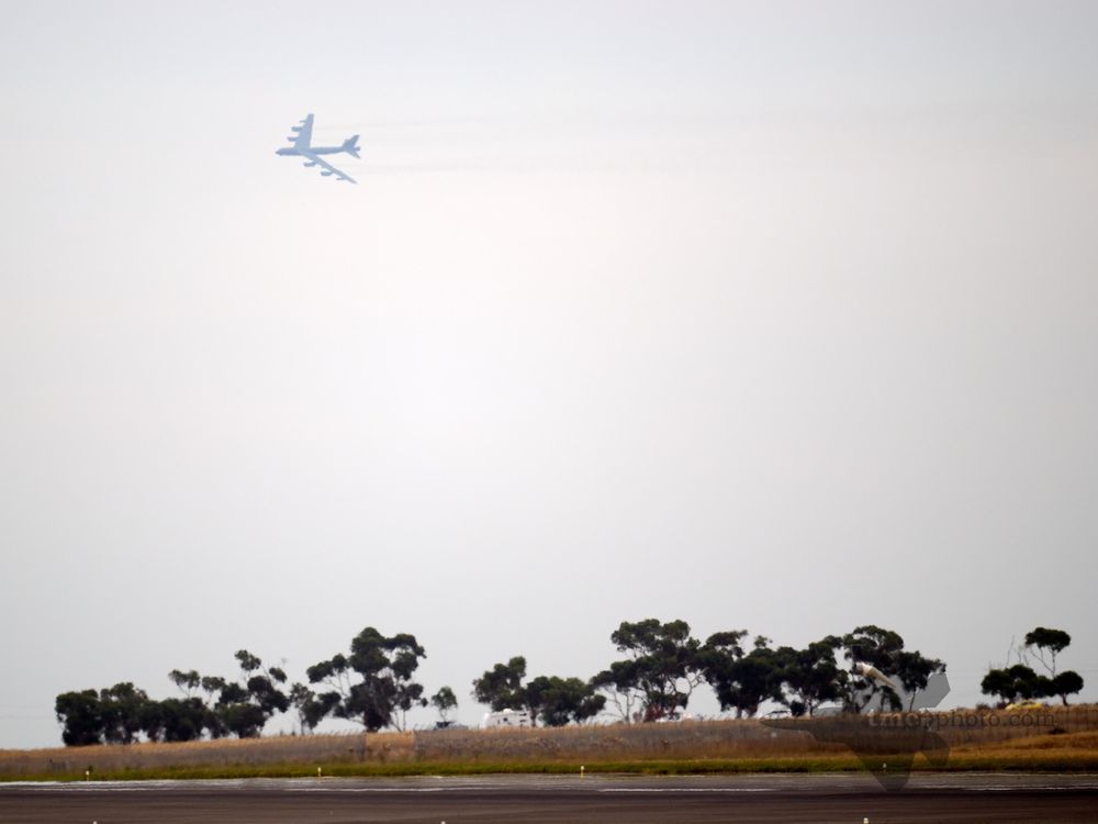 A USAF B-52H in the distance with the Australian scenery in the foreground. 