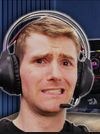 Linus Sebastien making a concerned face while wearing a headset