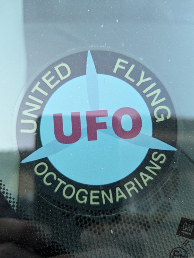 Sticker that says "United Flying Octogenarians"