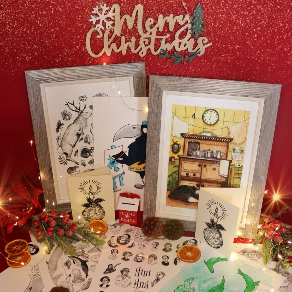 Photograph of a selection of prints available on Ciaraioch.com, surrounded by Christmas paraphernalia and decorations and beneath a sign that reads "Merry Christmas" (prints are supplied unframed, frames are for illustrative purposes only).