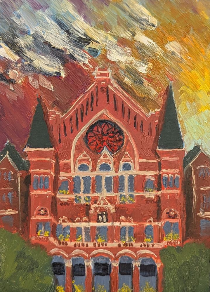a view of music hall in Cincinnati at sunset