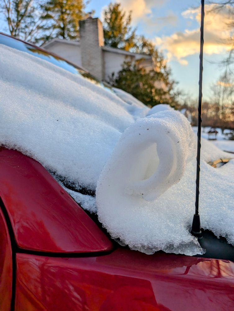 Snow roller on car