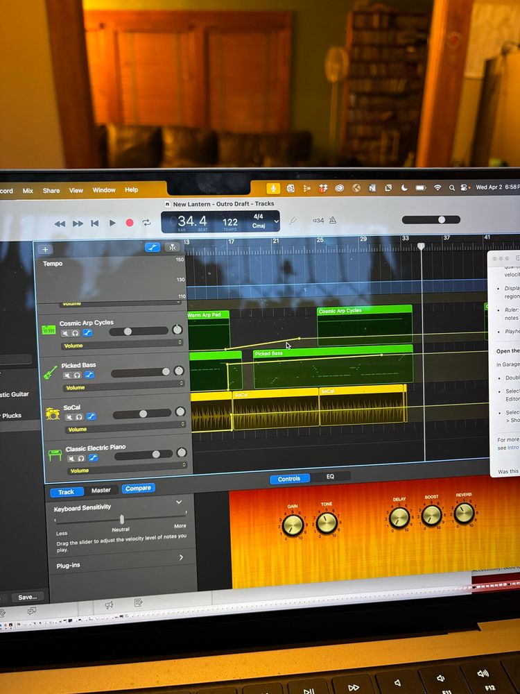 A digital audio work station is displayed 
on a laptop screen. 