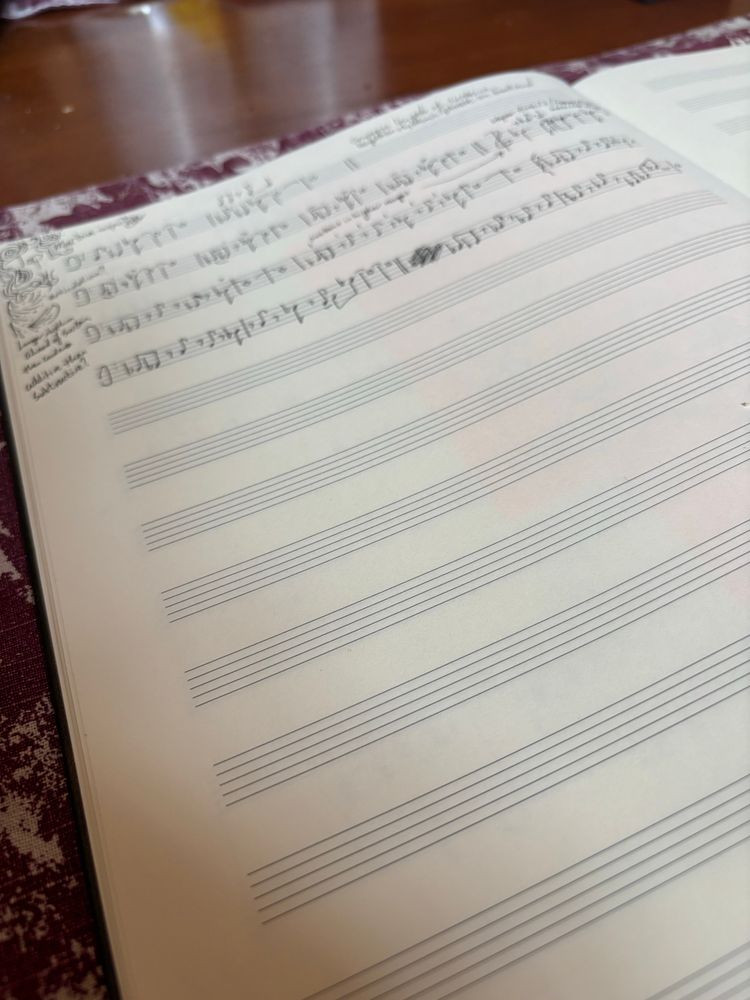 A notebook with handwritten music