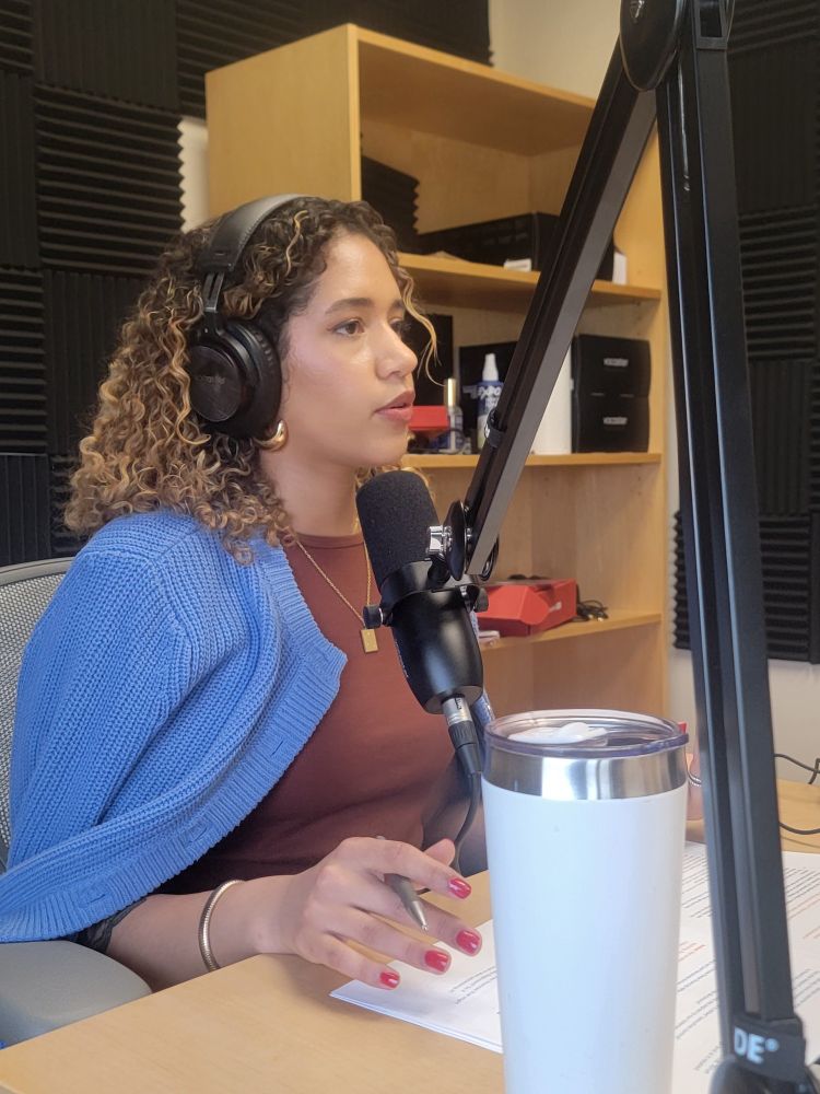 Woman talking into mic