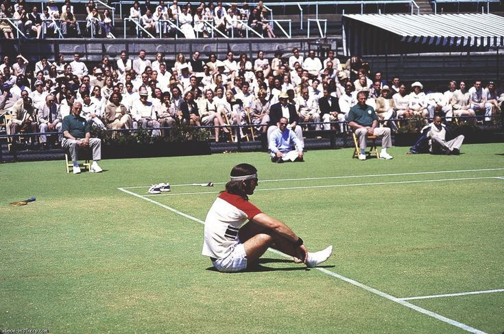 Photo of Richie Tenenbaum mid-meltdown in 'The Royal Tenenbaums'. He has taken off both shoes and one of his socks, and he appears to be crying.