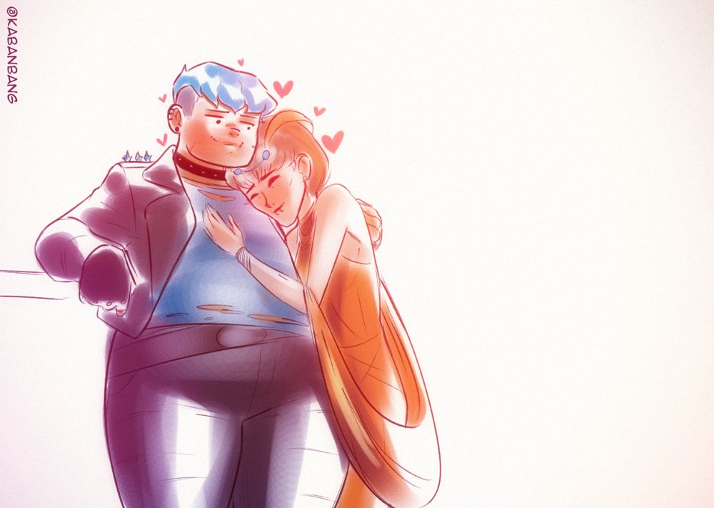 Godzilla and Mothra depicted as humans. Godzilla is depicted as a fat butch lesbian with blue hair, leather jacket and pants, a blue shirt underneath and a black choker. Mothra is depicted as a skinny woman with a yellow-brown dress. 