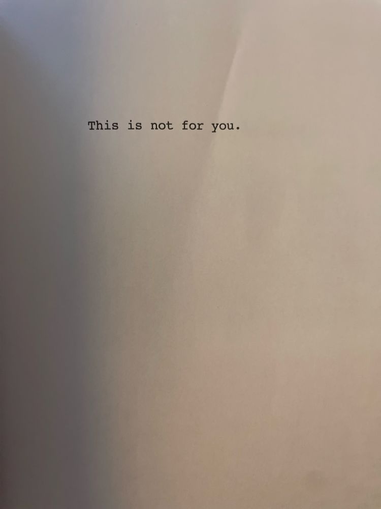 White page with black typewriter font that reads “This is not for you.”
