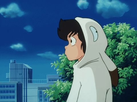 a cartoon character wearing a white hooded jacket with ears