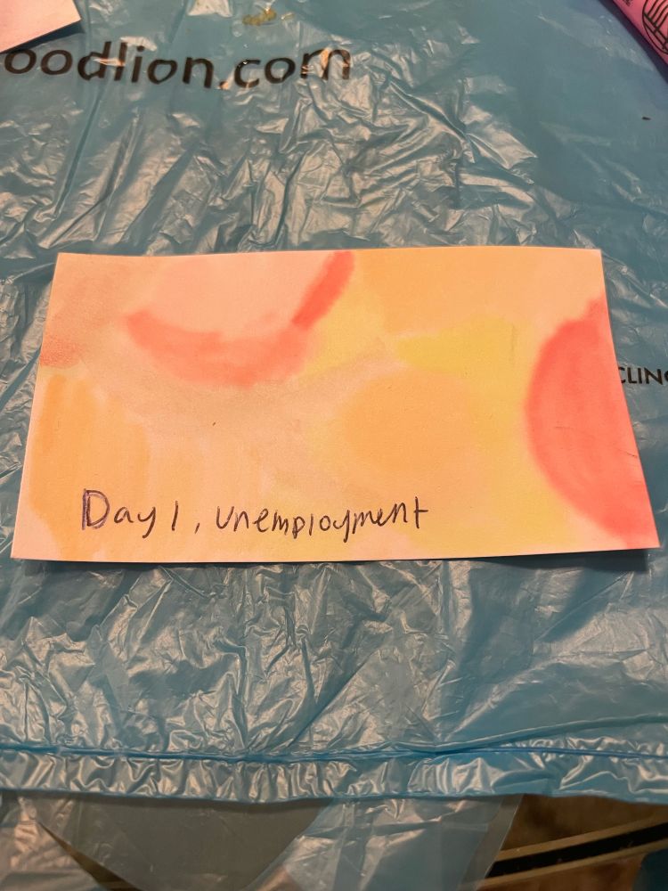 Watercolor on the back of a business card with the text “Day 1, unemployment”