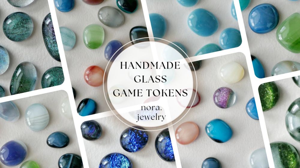 handmade glass game tokens: nora.jewelry

a bunch of clusters of small glass cabochons are pictured behind the text