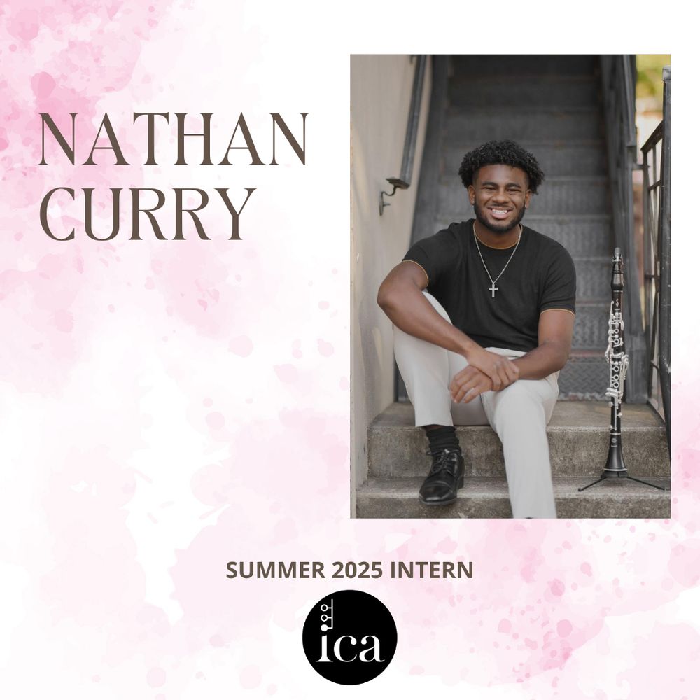 Smiling young man seated on stairs beside a clarinet, wearing a black t-shirt and light pants. Text reads: "Nathan Curry, Summer 2025 Intern." Pink watercolor background.