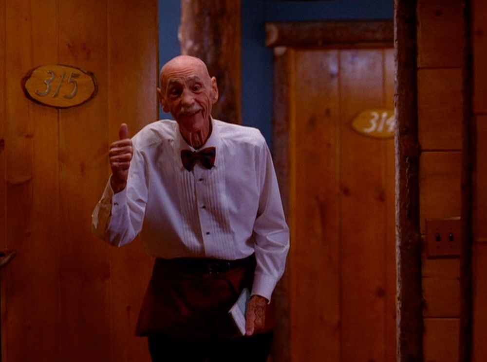 Hank Worden / The Waiter from Twin Peaks giving Cooper a thumbs up as he bleeds out on the floor.