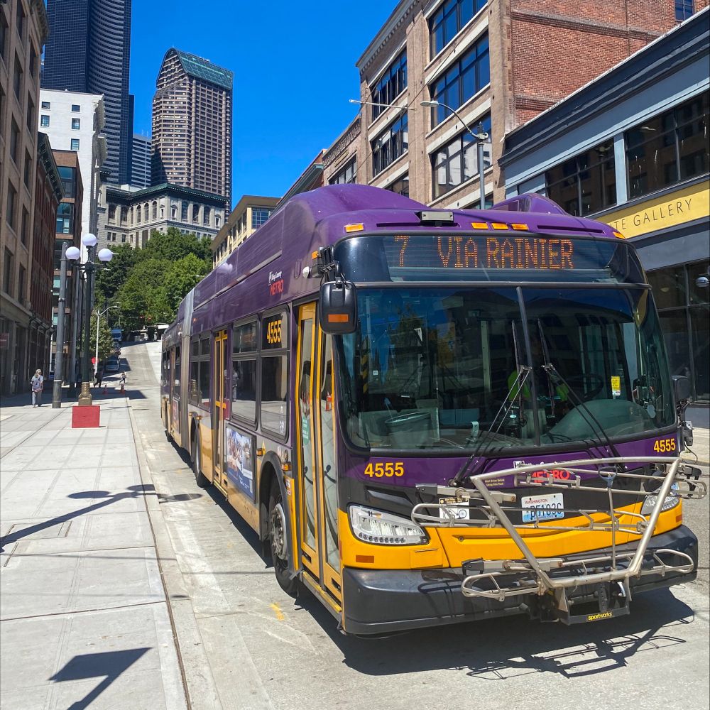 A King County Metro Route 7 bus at 3rd Ave and Main St in downtown Seattle. The bus stop area was recently widened and the street repaved, as well as other improvements.