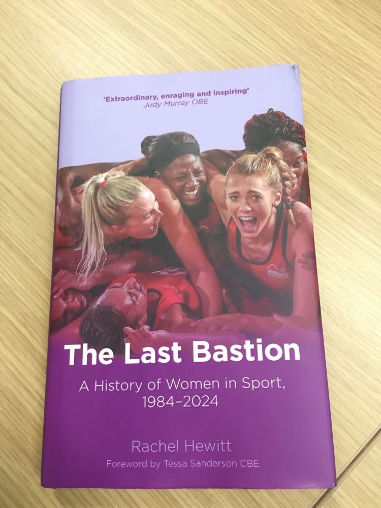 book cover showing young women celebrating a win