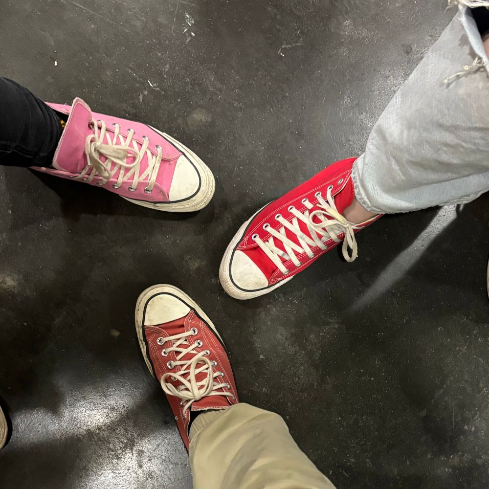 Jadzia's, Zoe's and Greg's Converse sneakers.