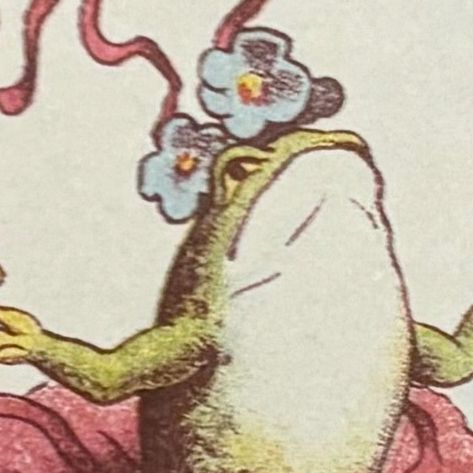 Close up of the toad-ballerina-juggler. She's got flowers on her head. Like you even care.