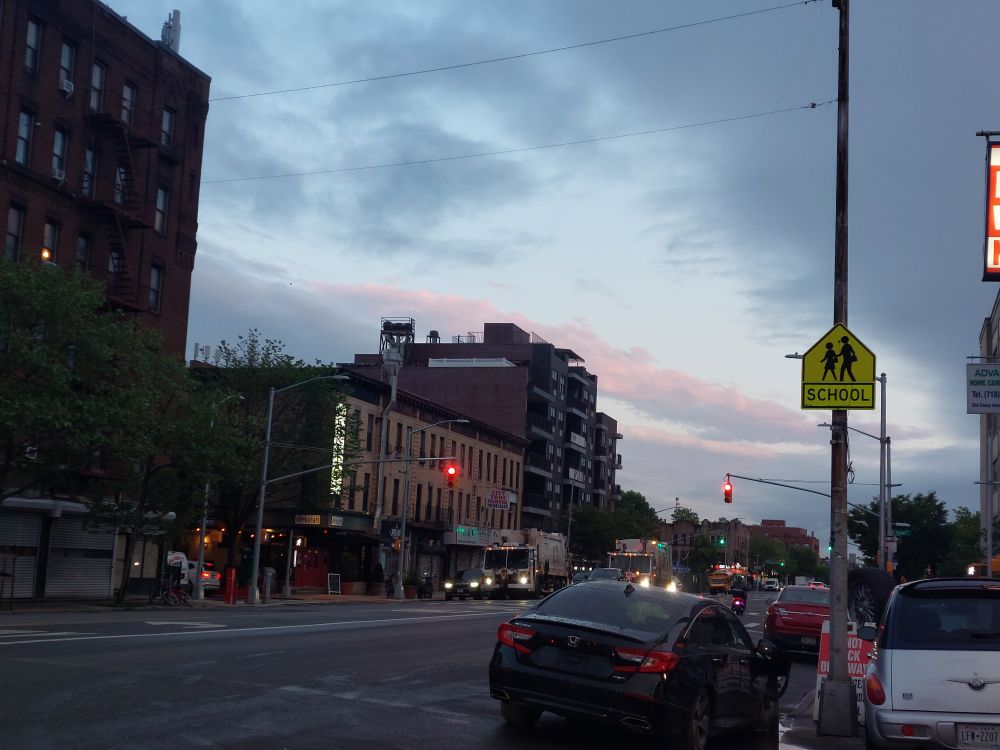 clouds and a city street