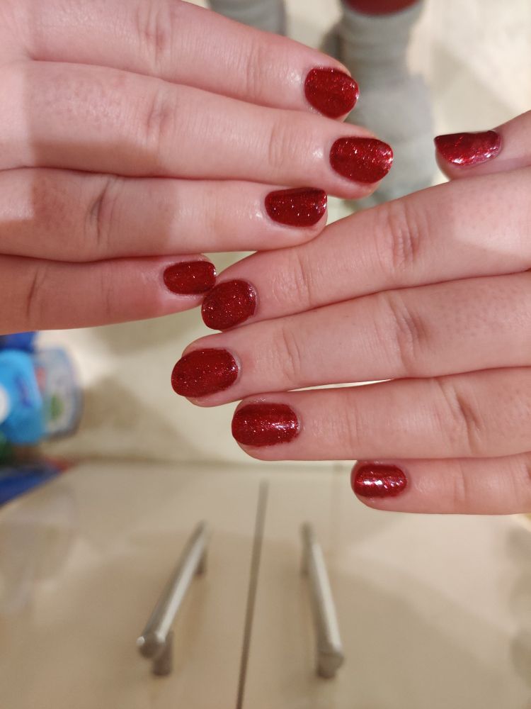 glittery red (polish name: candy cane) gel nails