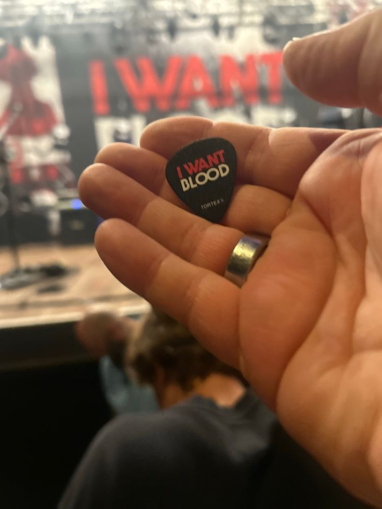 Jerry Cantrell’s guitar pic in my hand at his concert. 