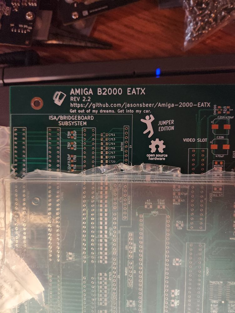 Picture of the upper-left corner of a bare Amiga B2000 EATX motherboard.