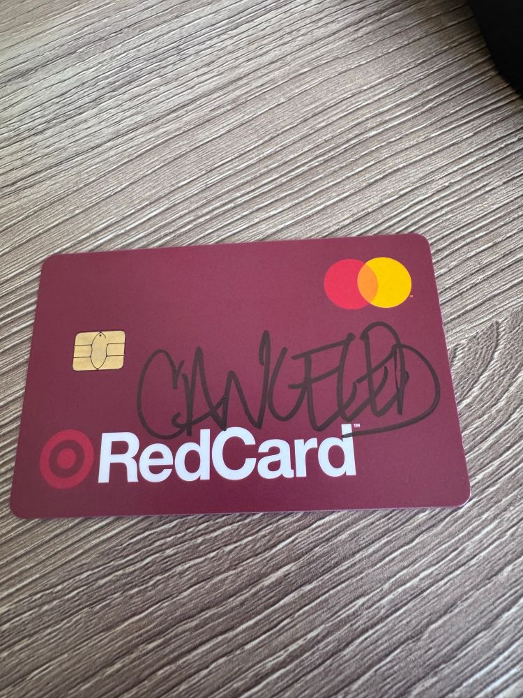 Red card from target with canceled written in sharpie 