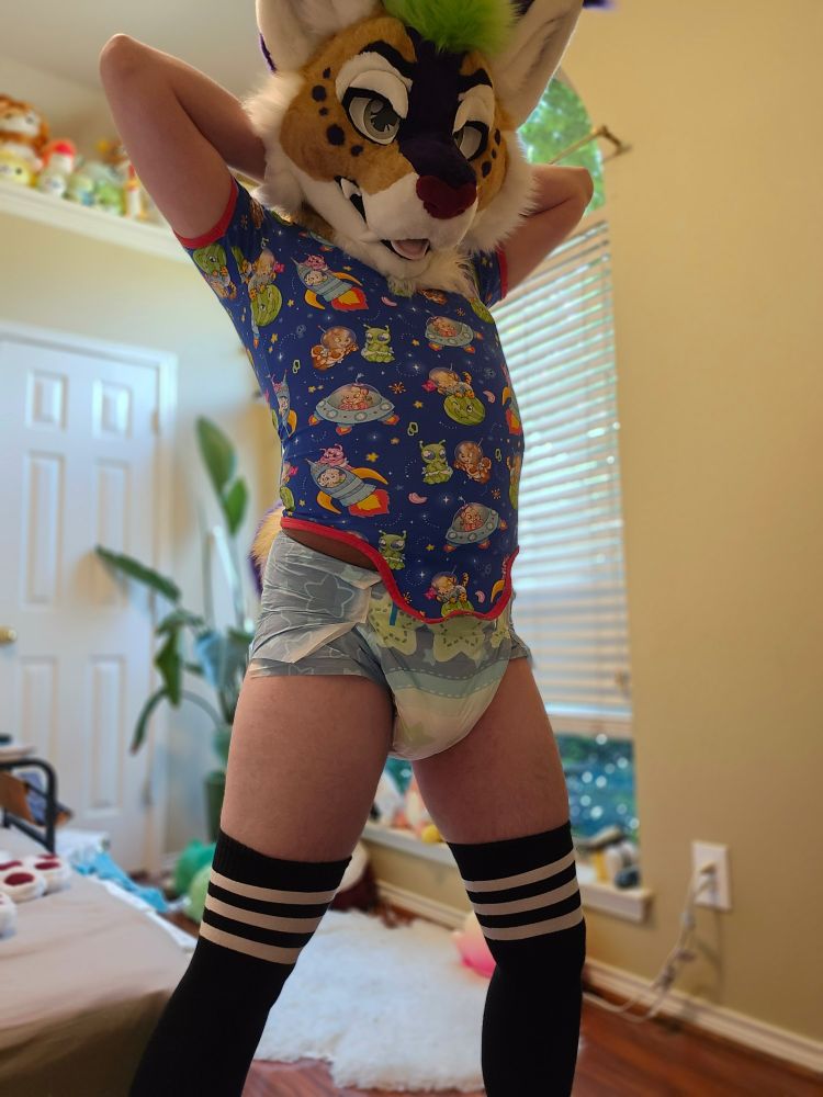 in fursuit, a blue space onesie, and the new starry nights diaper from poofypins
