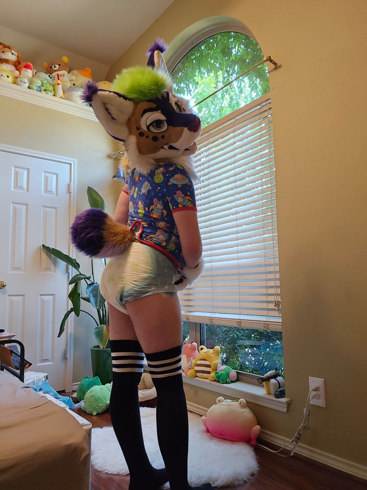 in fursuit, a blue space onesie, and the new starry nights diaper from poofypins
