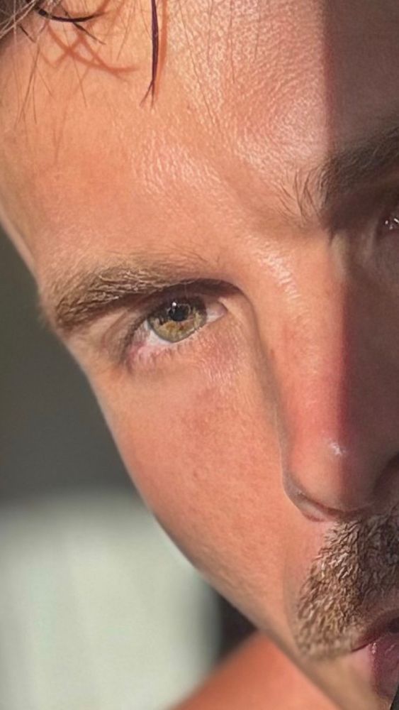 Extra close up shot of a green eye and a mustache. Both property of Kingofflop 